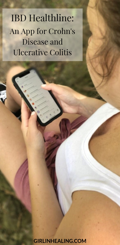 girl looking at IBD Healthline app on iPhone